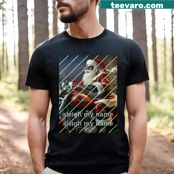 Santa on a motorcycle sleigh graphic on an essential T-shirt