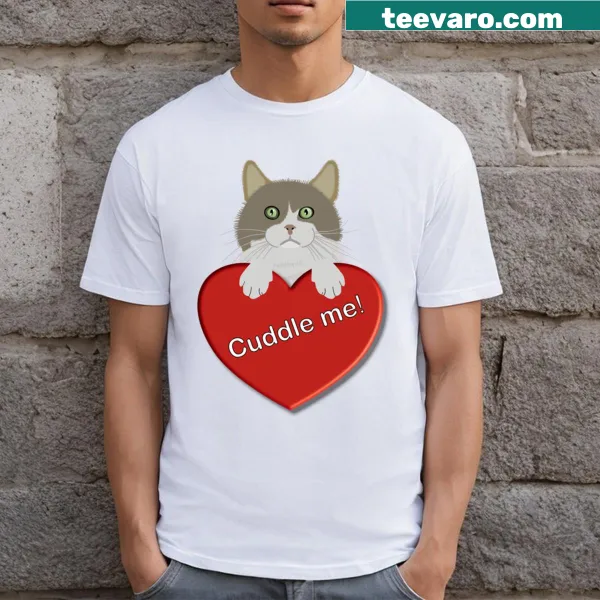 T-shirt featuring a cat resting on a heart illustration
