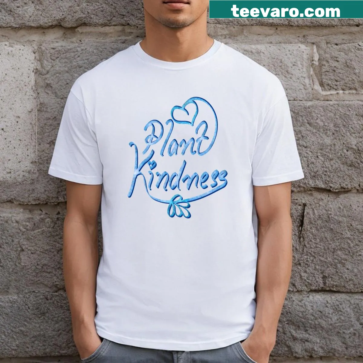 T-shirt featuring the motivational quote 'Plant Kindness' in elegant typography. — on a men's t-shirt