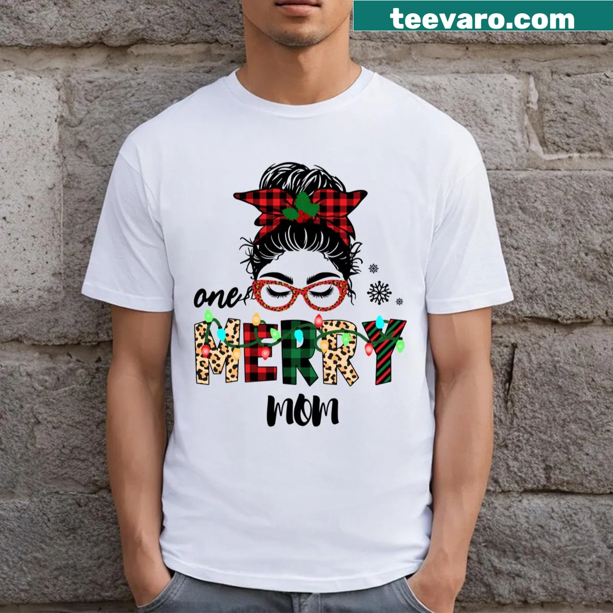One Merry Mom t-shirt with messy bun graphic and festive text — on a men's t-shirt