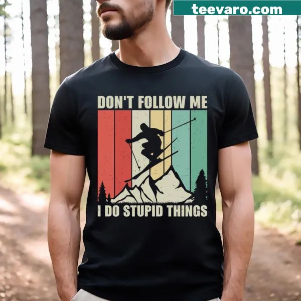 Funny skiing design T-shirt with text warning about stupid things
