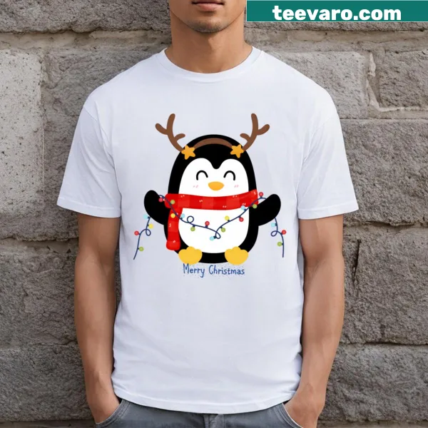 Cute penguin with Christmas lights on a festive t-shirt