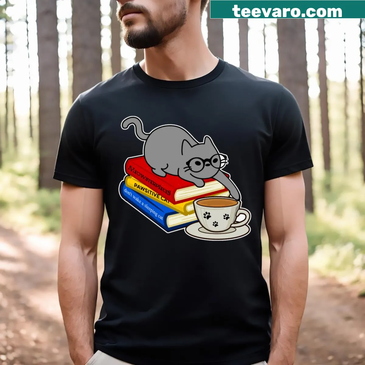 Illustrated t-shirt with a playful cat on books — on a men's t-shirt