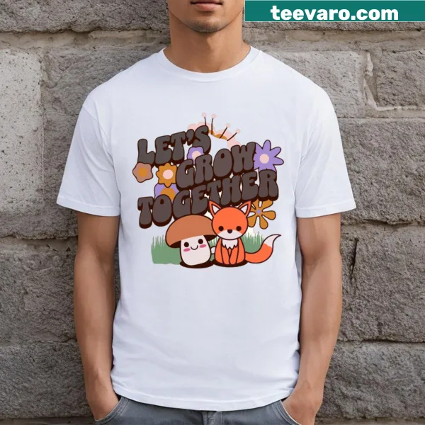 Cartoon T-shirt featuring cute cats and a message of togetherness.