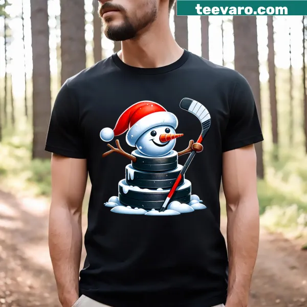 Cartoon snowman with Santa hat and hockey puck on t-shirt