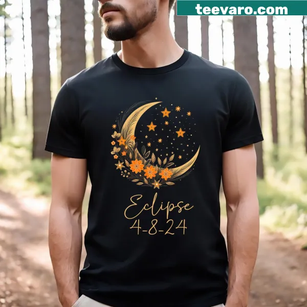 Illustrated t-shirt featuring a solar eclipse surrounded by floral elements