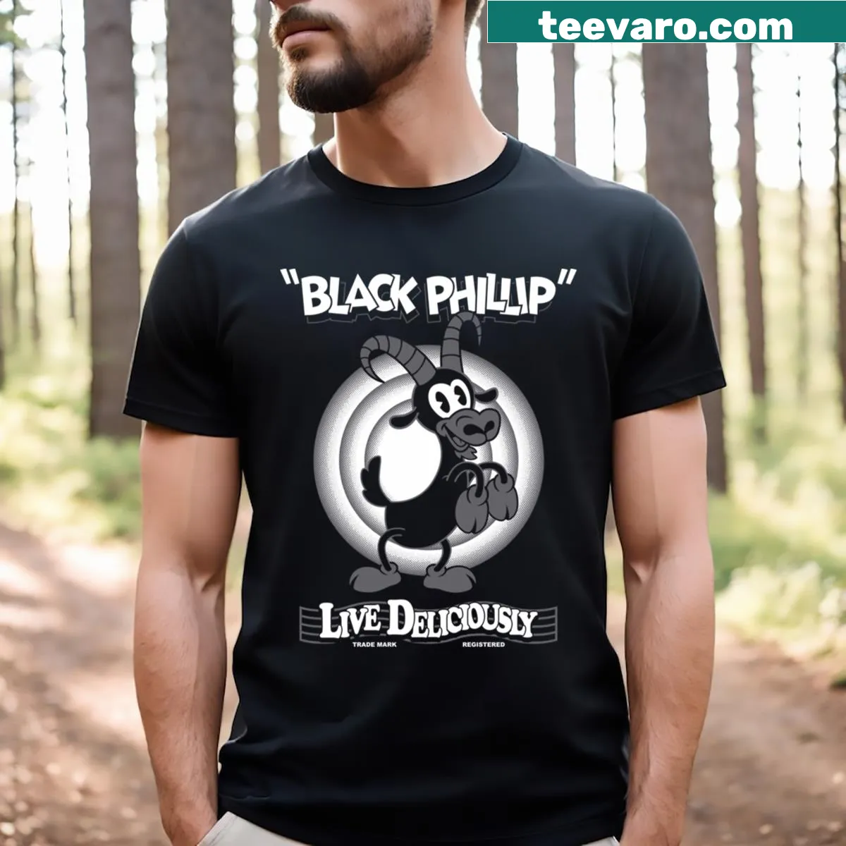 Vintage cartoon goat Black Phillip pullover t-shirt with 'Live Deliciously' text — on a men's t-shirt