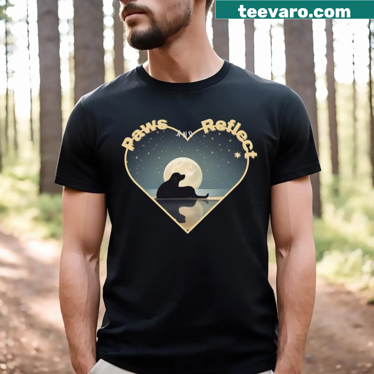 Silhouette of a dog against a moonlit sky on a T-shirt. — on a men's t-shirt