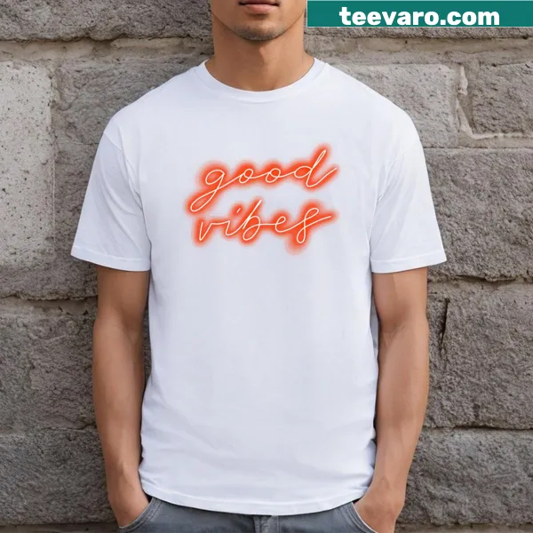 T-shirt featuring 'Good Vibes' text in bold typography
