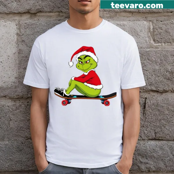 Funny female Grinch sitting on a skateboard graphic on a t-shirt