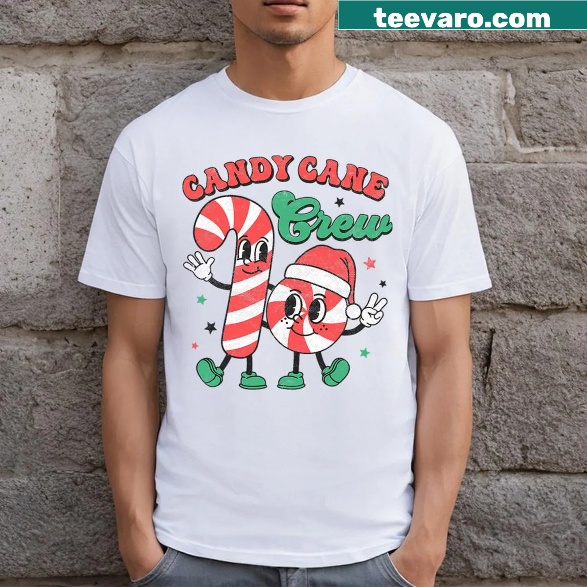 Kids T-shirt featuring playful candy cane graphics for Christmas. — on a men's t-shirt