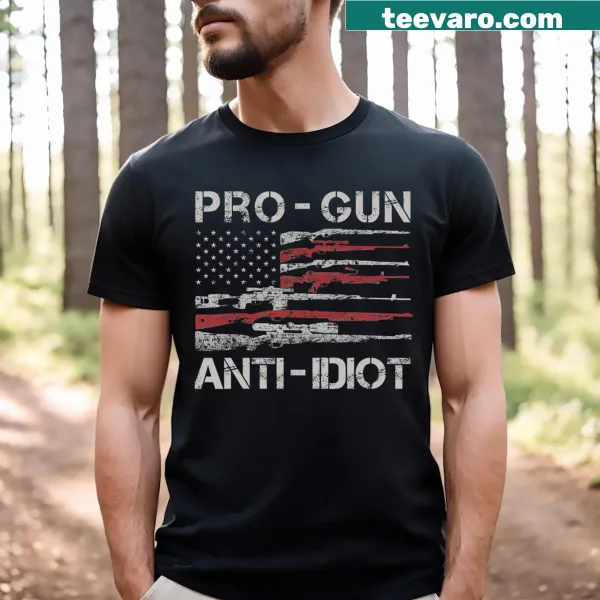 Vintage-style T-shirt with USA flag and pro-gun message.