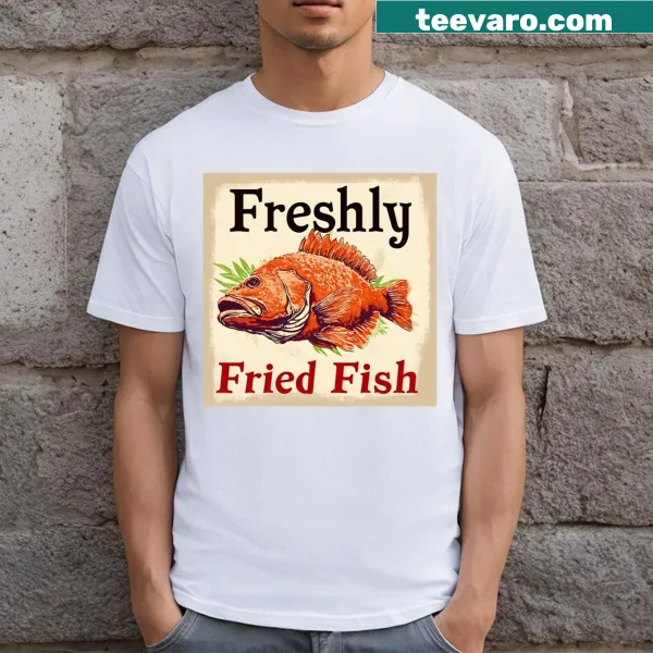 T-shirt featuring playful typography of 'Freshly Fried Fish' for fun phonetic challenge