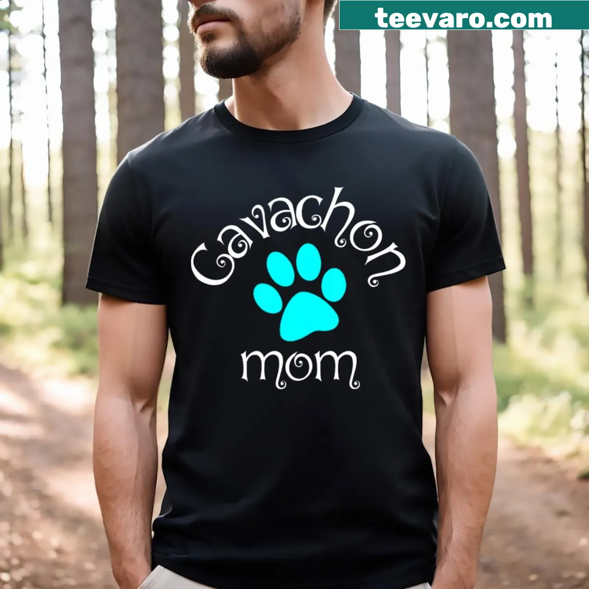 Hand-lettered Cavachon Mom design with blue paw print — on a men's t-shirt