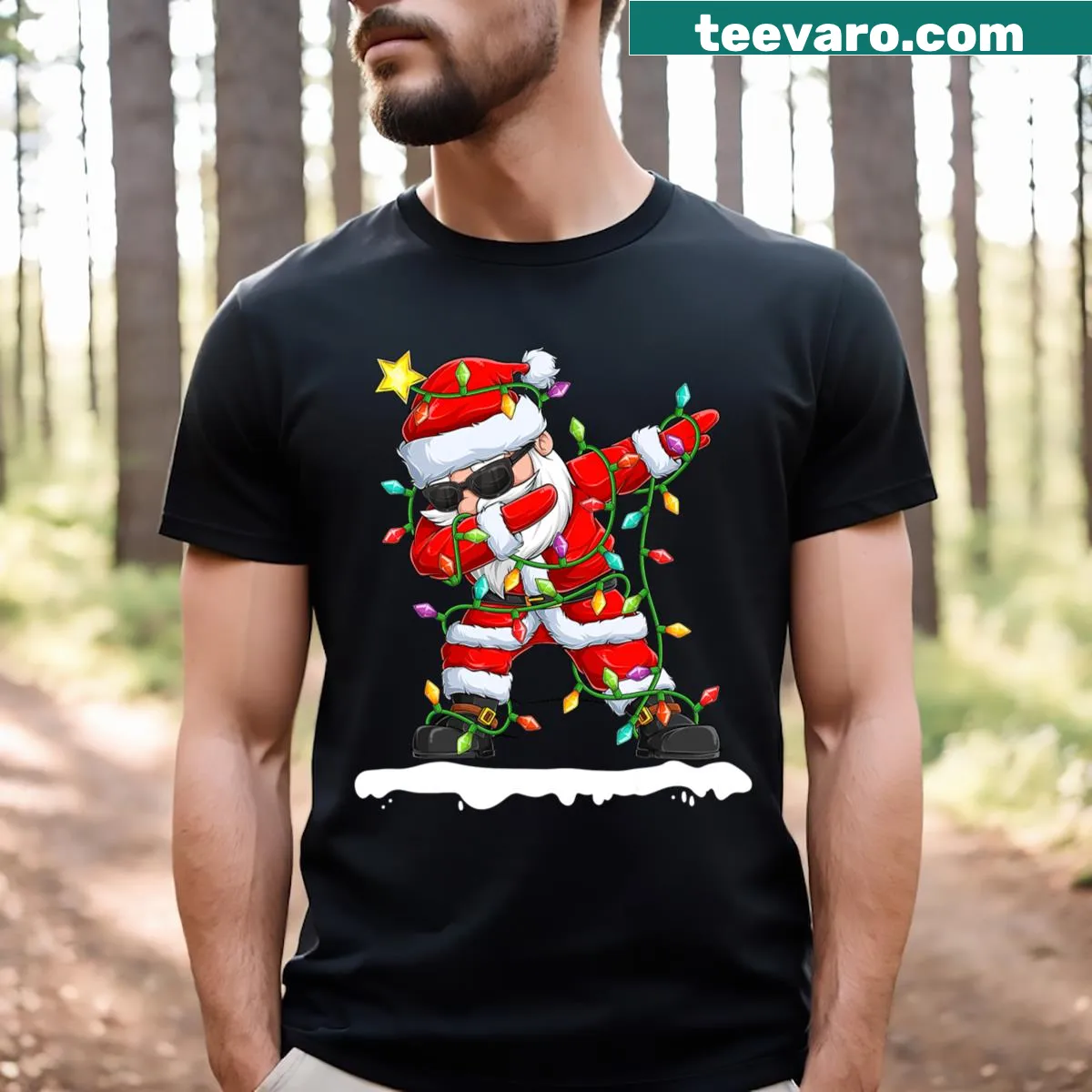 Dabbing Santa surrounded by Christmas tree lights t-shirt for kids. — on a men's t-shirt
