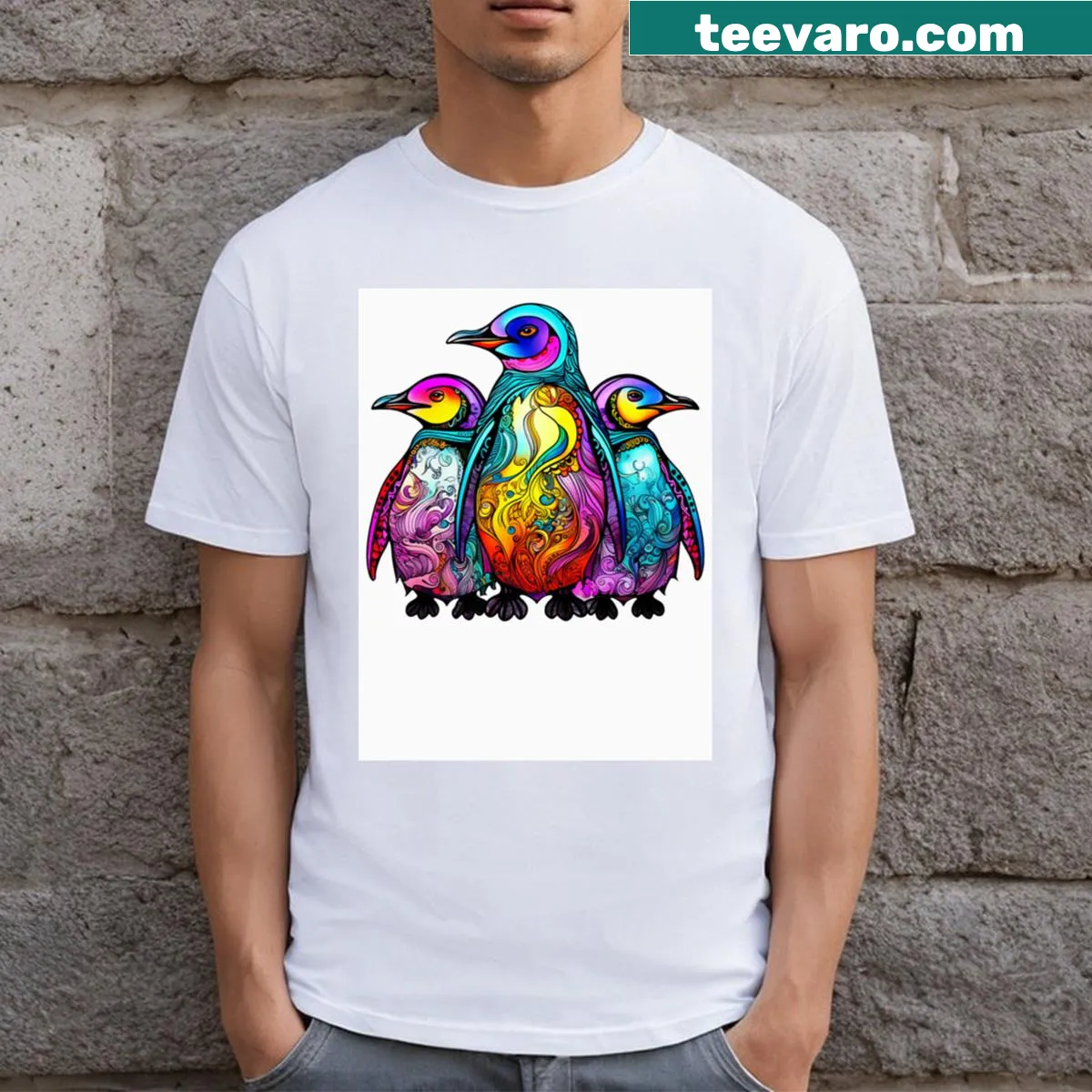Illustrated t-shirt featuring three playful penguins — on a men's t-shirt