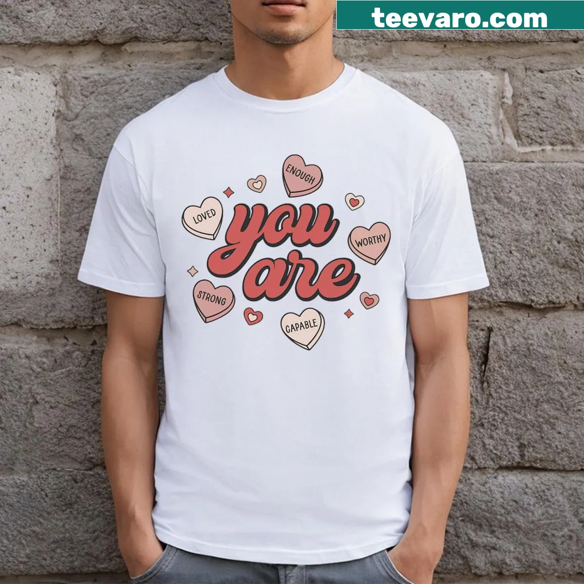 Valentine's Day T-shirt for teachers with candy heart graphics and a positive message — on a men's t-shirt