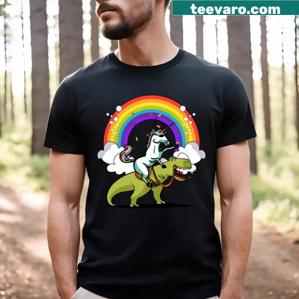 Cartoon T-shirt featuring a unicorn riding a T-rex dinosaur
