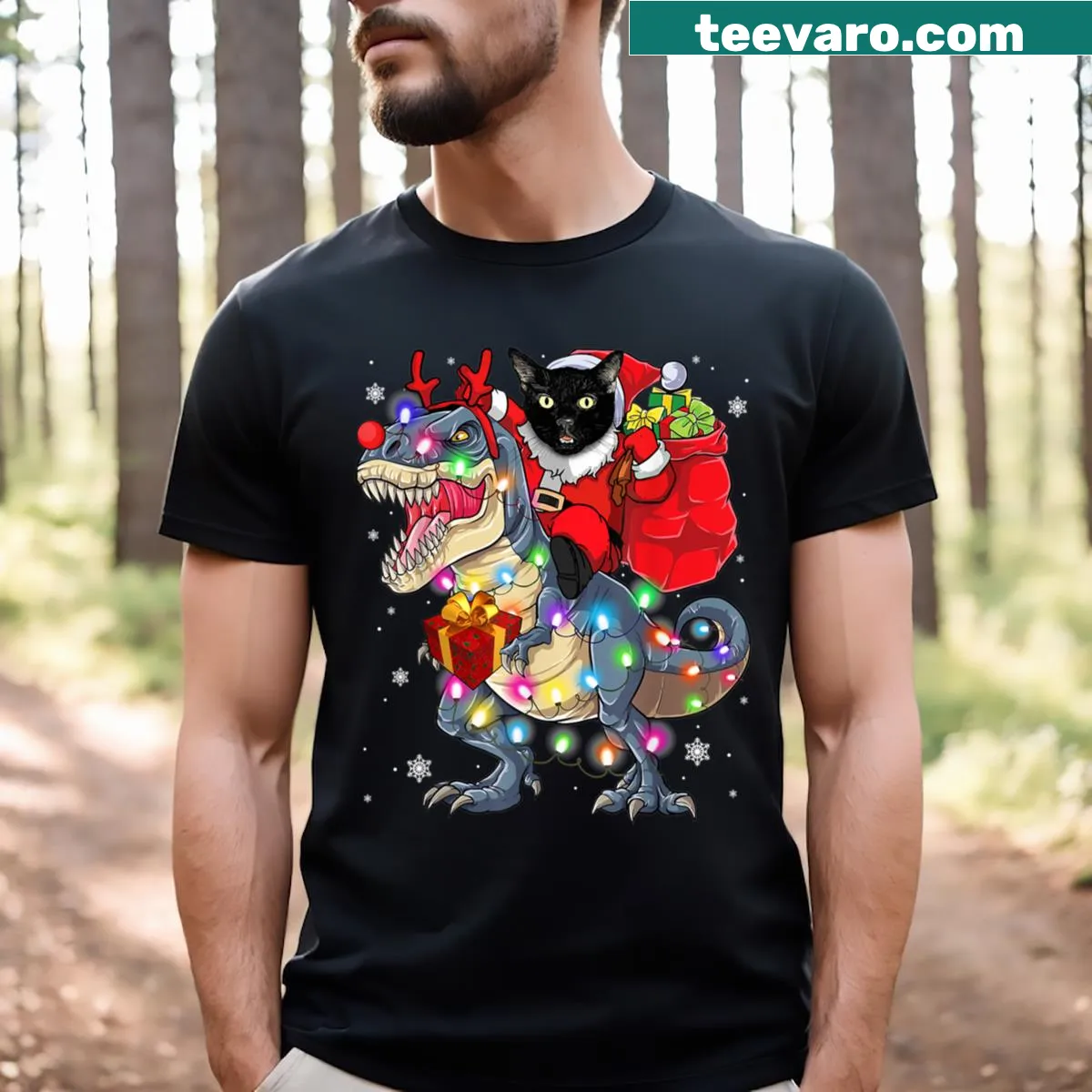 Whimsical T-shirt featuring a cat riding a T-Rex for Christmas — on a men's t-shirt