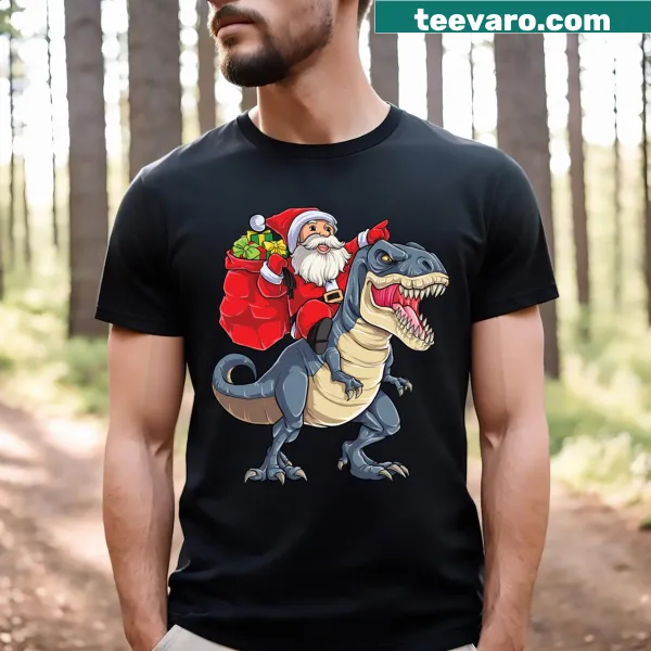 Santa riding a T-Rex dinosaur graphic on a kids T-shirt
