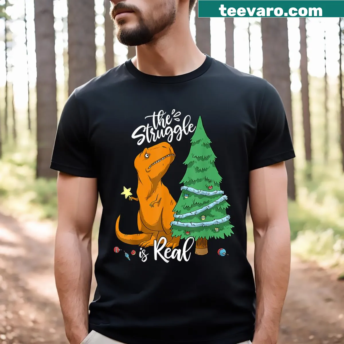Funny T-shirt with T-Rex struggling with a Christmas tree — on a men's t-shirt