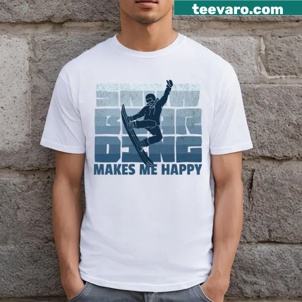 T-shirt with the text Snowboarding Makes Me Happy in bold typography.
