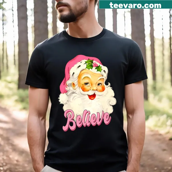 Vintage pink Christmas tee with Santa Claus and 'Believe' text