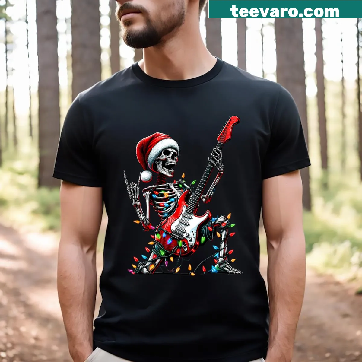 Skeleton hand as Santa making a rock n roll sign on T-shirt — on a men's t-shirt