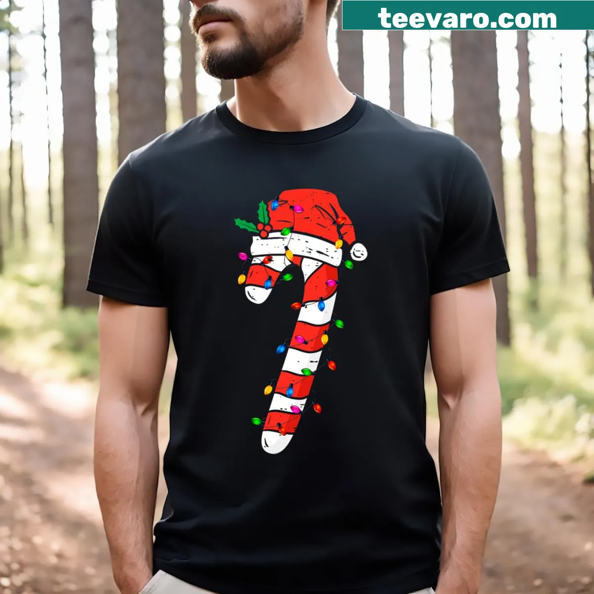 Christmas t-shirt featuring Santa and candy cane illustration — on a men's t-shirt