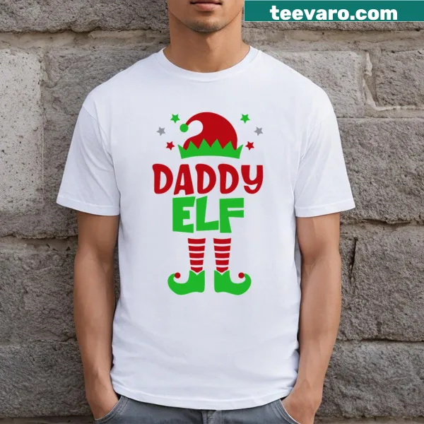 Matching Christmas family elf T-shirts for dad, mum, and baby