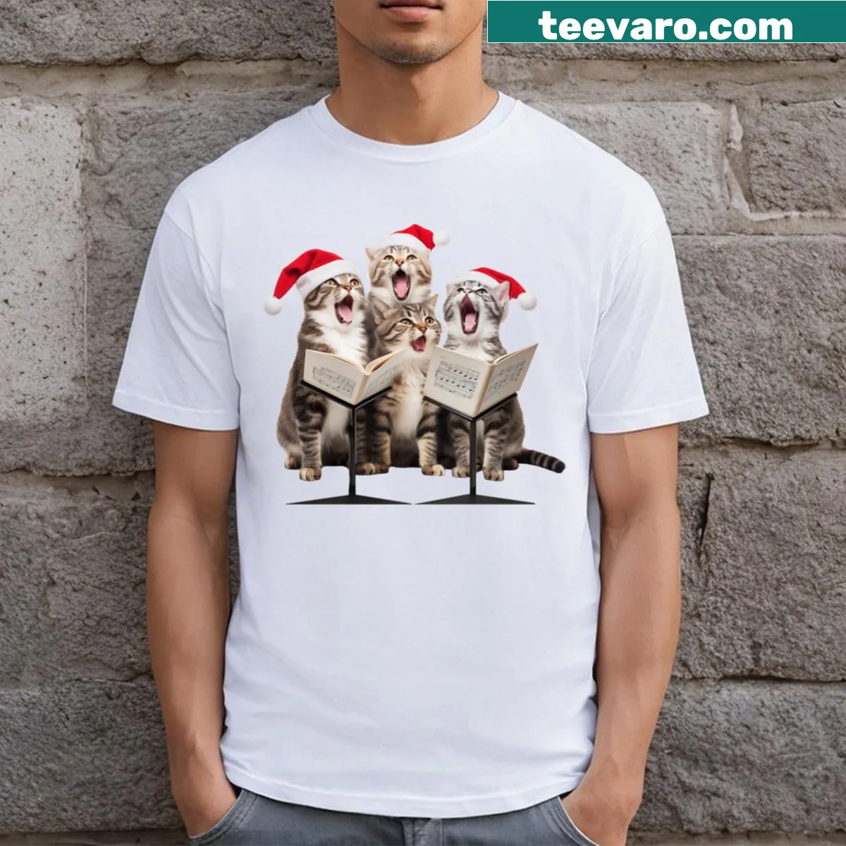 Funny Christmas t-shirt featuring caroling cats design — on a men's t-shirt