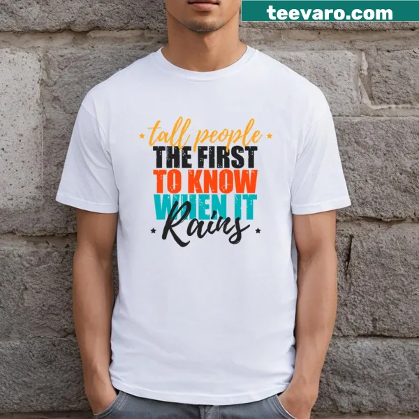T-shirt designed for tall men featuring funny quotes about height.