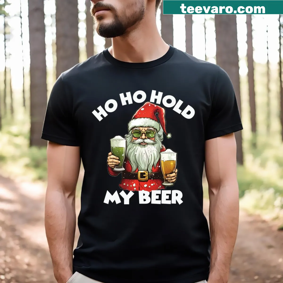 Funny Christmas t-shirt with Santa and the phrase Ho Ho Hold My Beer — on a men's t-shirt
