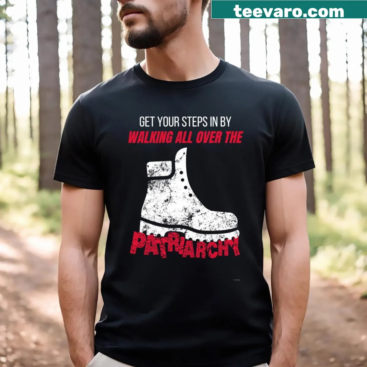 T-shirt featuring the phrase 'Get Your Steps In By Walking All Over The Patriarchy' in bold typography — on a men's t-shirt