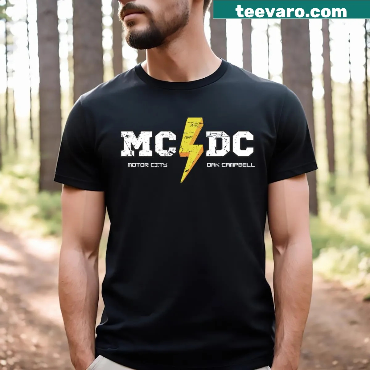 T-shirt featuring bold text supporting Dan Campbell — on a men's t-shirt