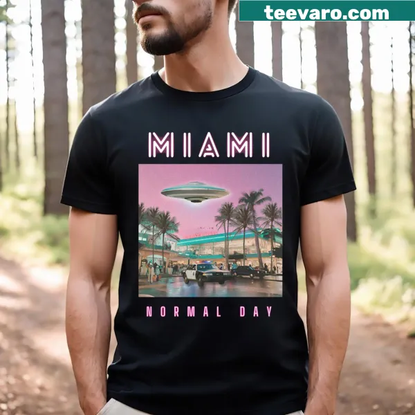 Illustrated T-shirt featuring an alien UFO over a Miami mall