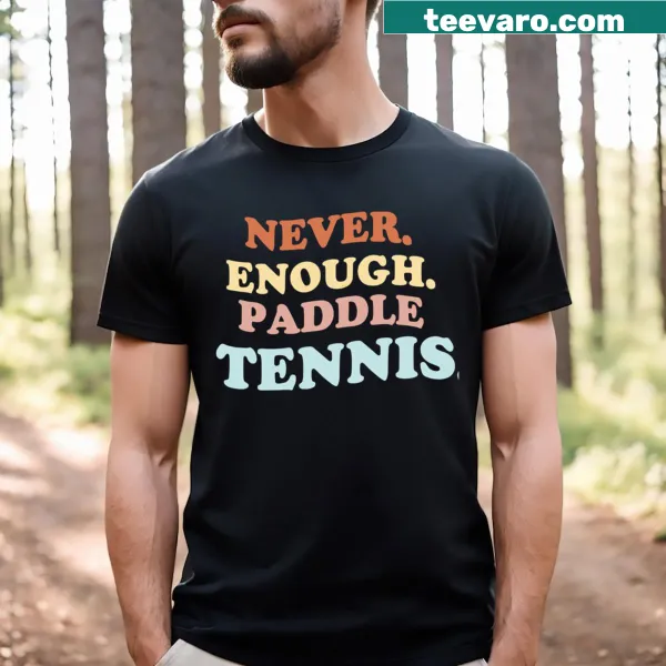 White t-shirt featuring a humorous text about paddle tennis