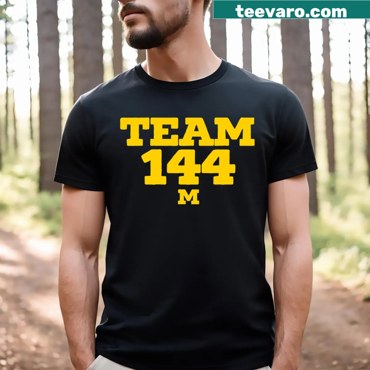 Team 144 T-shirt representing Michigan Wolverines football — on a men's t-shirt
