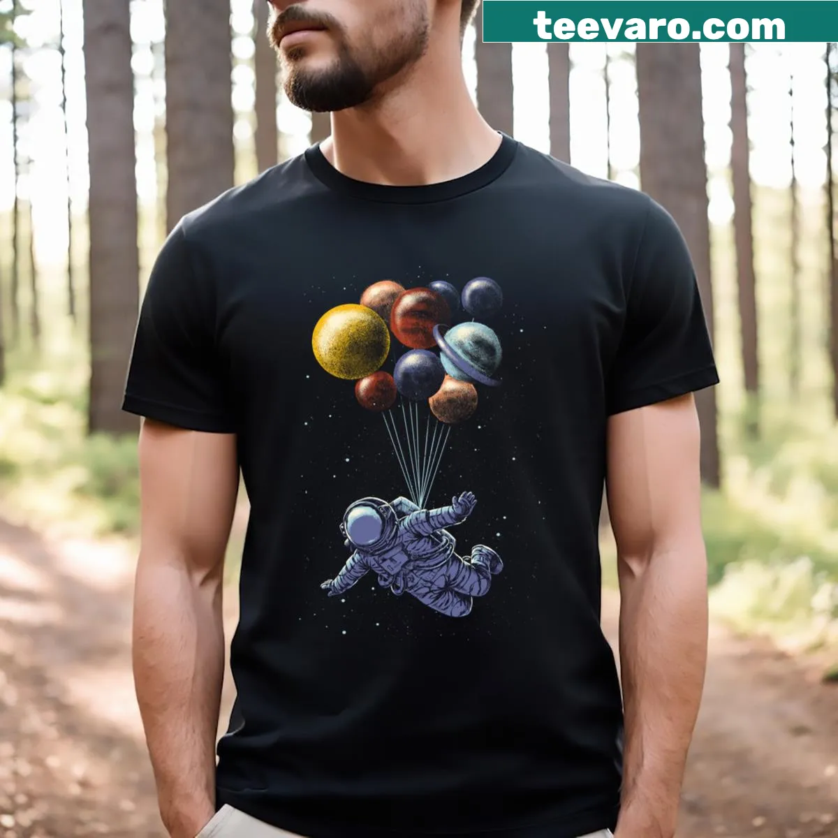 T-shirt featuring a whimsical space travel design with rockets and planets — on a men's t-shirt