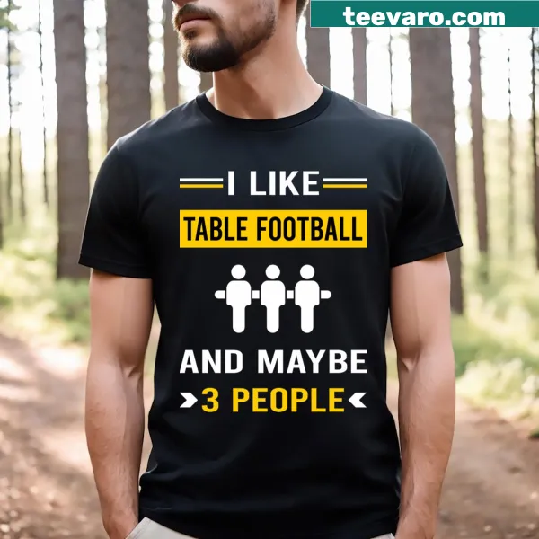 Fun foosball t-shirt with three players in action
