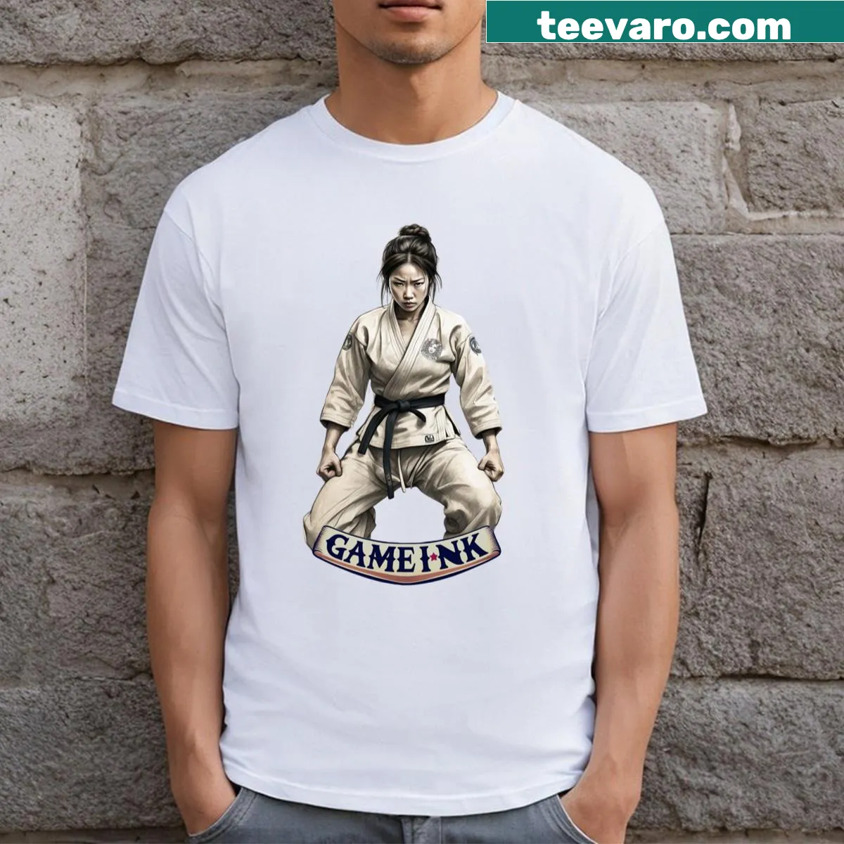 Bold typography Gameink logo on a women's martial arts T-shirt — on a men's t-shirt