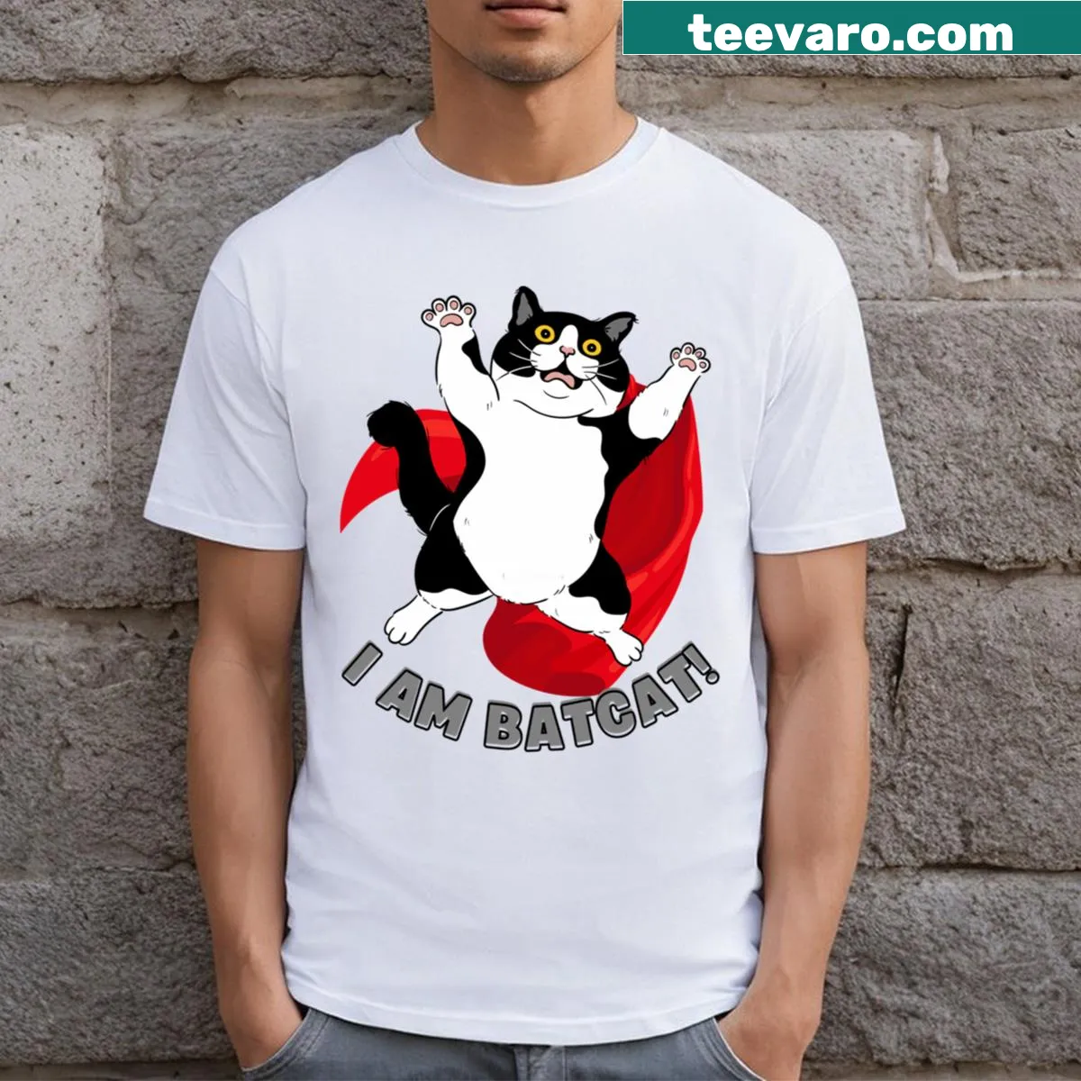 Funny T-shirt featuring a cat dressed as a bat — on a men's t-shirt