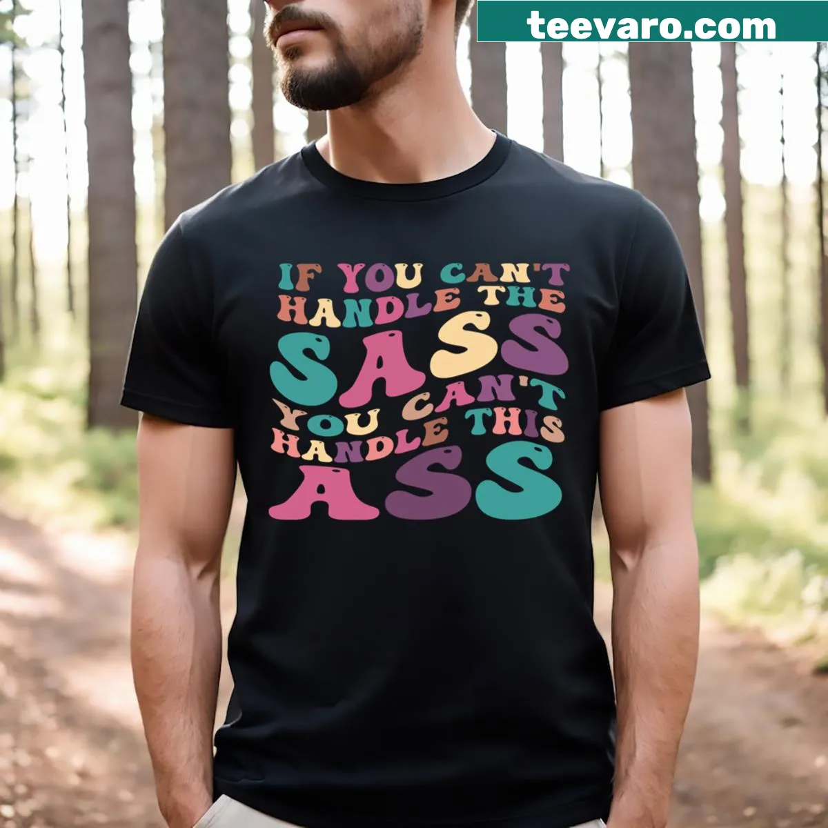 Funny T-shirt with the phrase 'If You Can't Handle The Sass You Can't Handle This Ass' in hand-lettered design — on a men's t-shirt