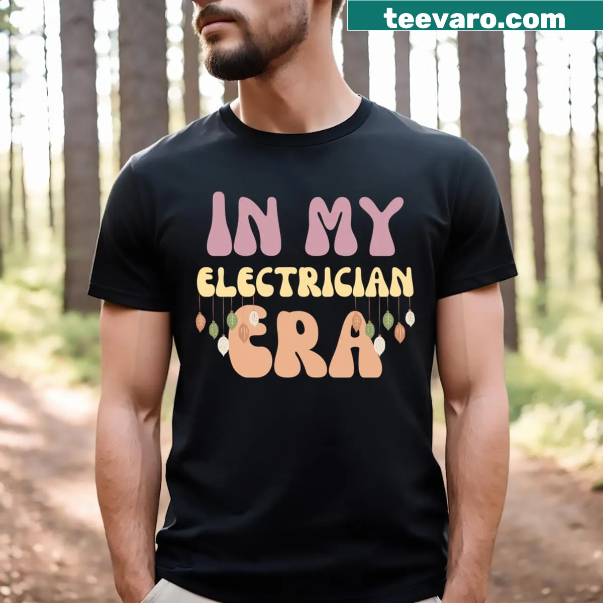 T-shirt featuring the phrase 'In My Electrician Era' in groovy typography — on a men's t-shirt