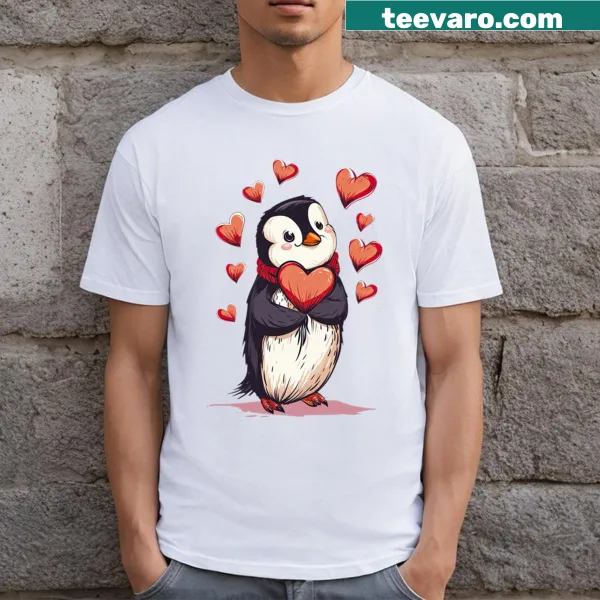 Illustration of a penguin holding a heart on a Valentine's Day T-shirt