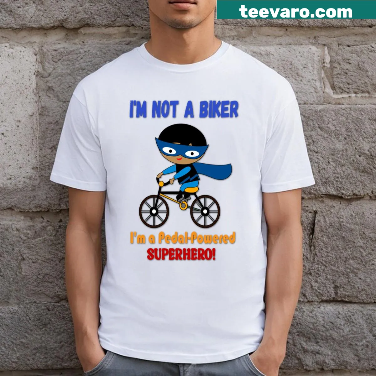 Playful t-shirt for kids featuring 'Pedal Powered Superhero' graphic — on a men's t-shirt