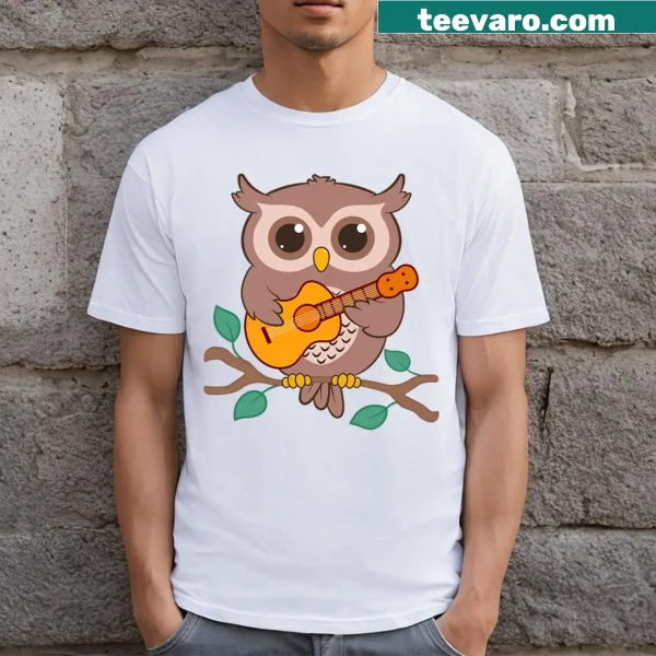 Cartoon owl playing acoustic guitar on a T-shirt.