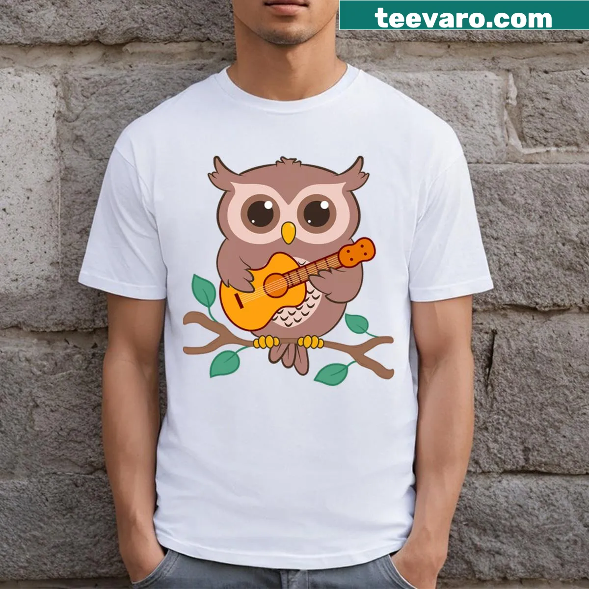 Cartoon owl playing acoustic guitar on a T-shirt. — on a men's t-shirt