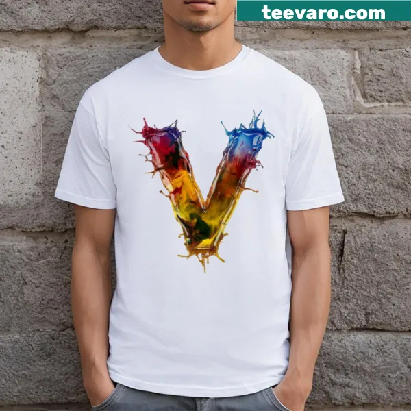 Artistic t-shirt featuring an arrangement of alphabet letters
