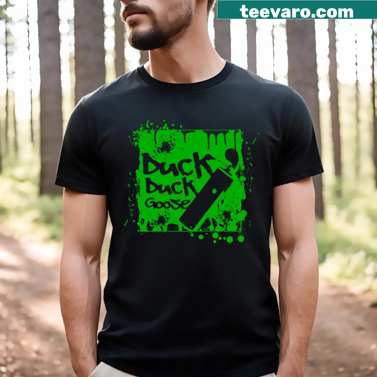 Playful Duck Duck Goose t-shirt with cartoon ducks and fun lettering. — on a men's t-shirt
